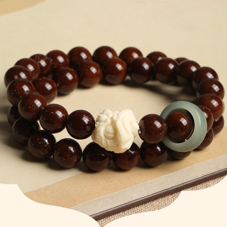 Natural Red Sandalwood Bodhi Seed Carved Lion Bracelet