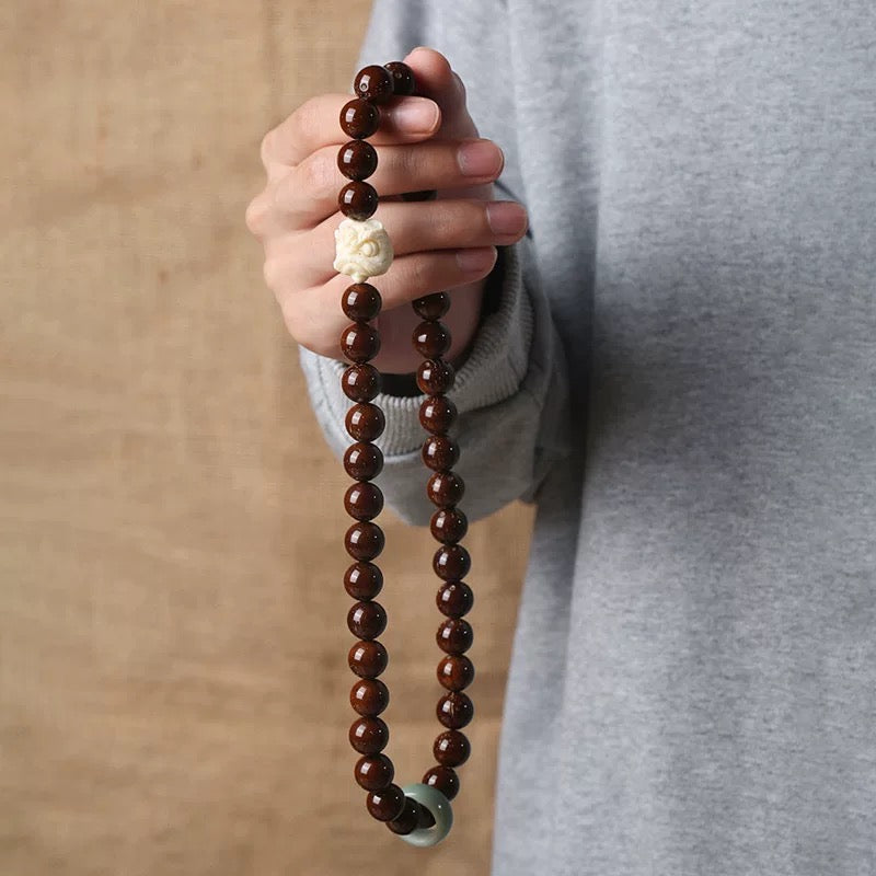 Natural Red Sandalwood Bodhi Seed Carved Lion Bracelet