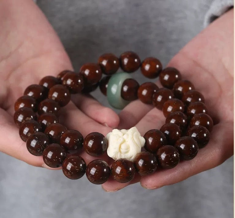 Natural Red Sandalwood Bodhi Seed Carved Lion Bracelet