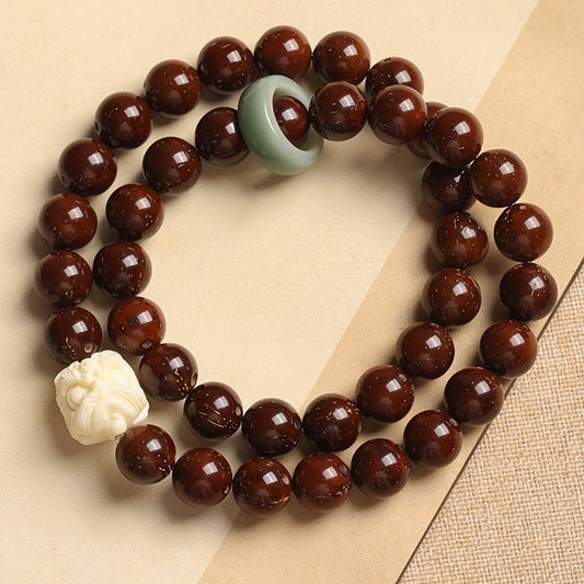 Natural Red Sandalwood Bodhi Seed Carved Lion Bracelet